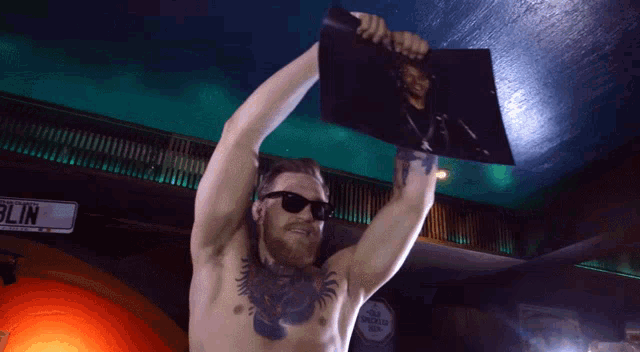 mcgregor-ripping-paper.gif